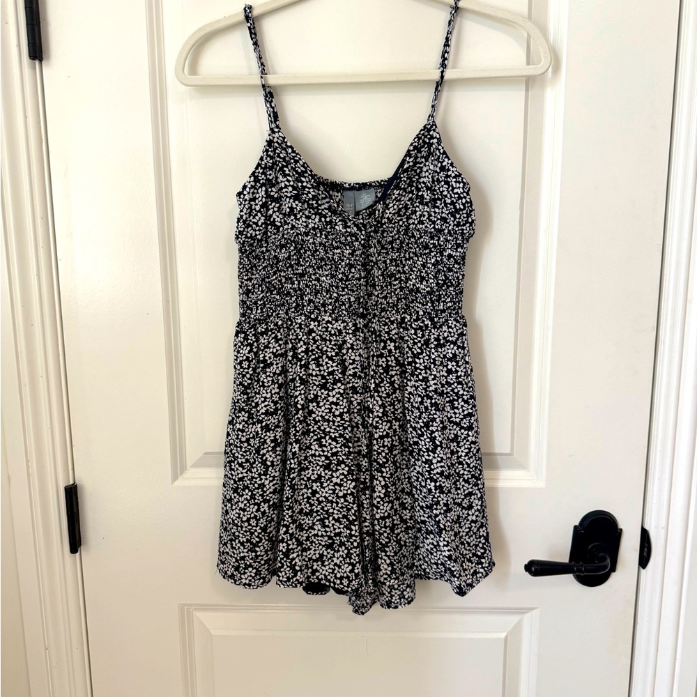 Tilly’s Sky and Soarrow Black Floral Romper
